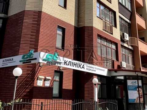 комерційна за адресою Євгена Коновальця вул. (Щорса), 32-Б