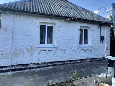 будинок за адресою с. Плоске, Центральна