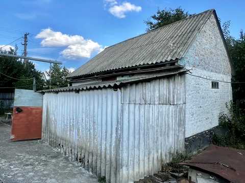 будинок за адресою с. Плоске, Центральна