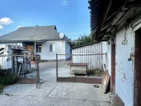 будинок за адресою с. Плоске, Центральна
