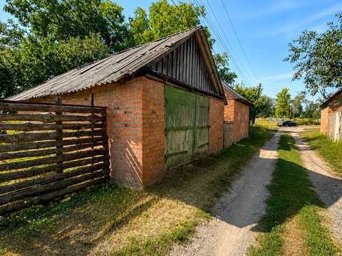 будинок за адресою Ромни, 1-й провулок Западинської, 82