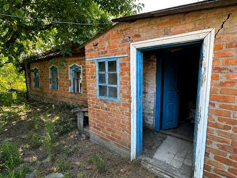 будинок за адресою Ромни, 1-й провулок Западинської, 82