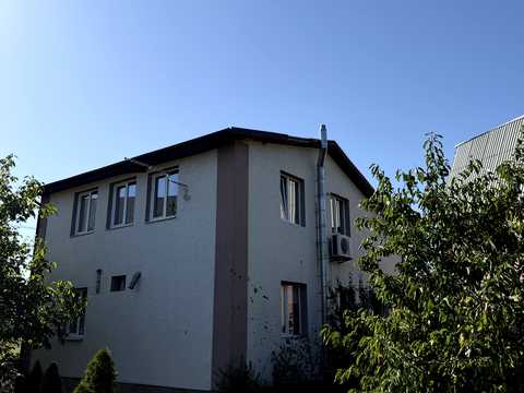 будинок за адресою смт. Гостомель, Ірпінська вул., 11