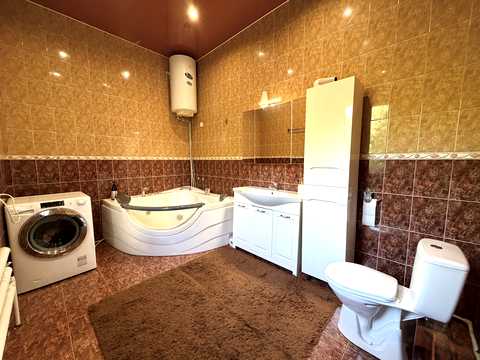 будинок за адресою смт. Гостомель, Ірпінська вул., 11