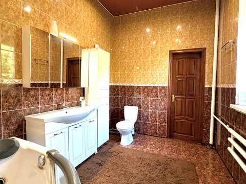 будинок за адресою смт. Гостомель, Ірпінська вул., 11
