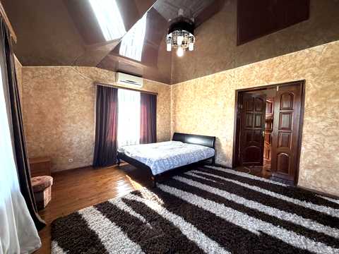 будинок за адресою смт. Гостомель, Ірпінська вул., 11