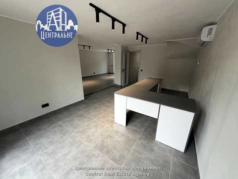 комерційна за адресою Миколаївська вул., 15