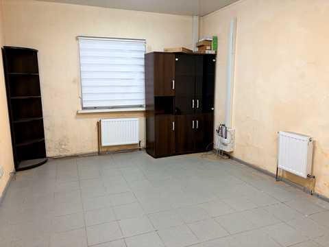 комерційна за адресою Куликівський узвіз (Революції), 7