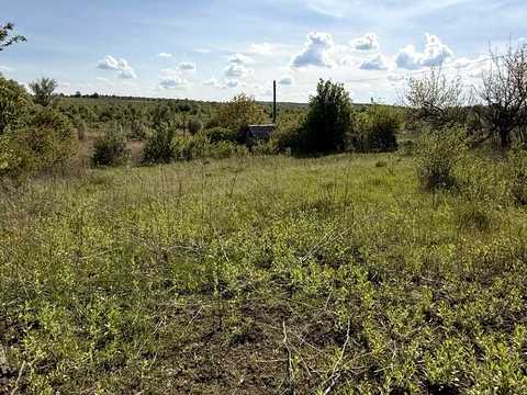 участок по адресу 1-й Мрії проезд