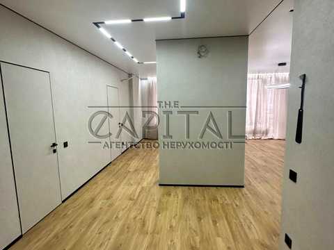 комерційна за адресою вул. Дніпровська наб., 18а