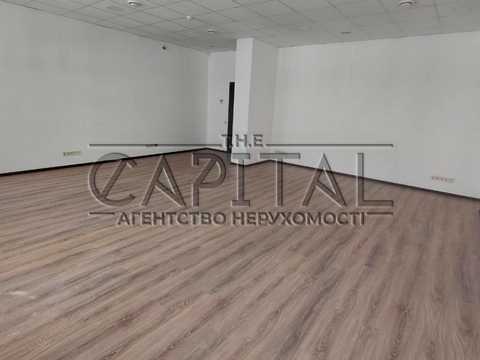 комерційна за адресою Євгена Коновальця вул. (Щорса), 44-А