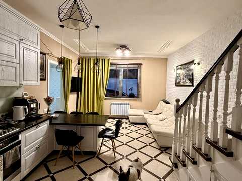 будинок за адресою Жоліо Кюрі вул.