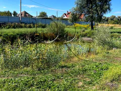 ділянка за адресою с. Пухівка, Піщана вулиця