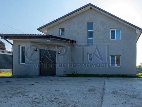 будинок за адресою с. Великі Дмитровичі, Тиханська вул., 2