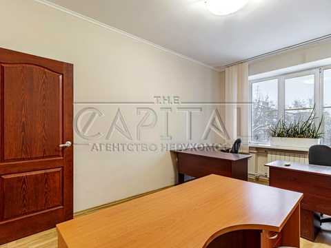 комерційна за адресою Шовковична вул., 7-А