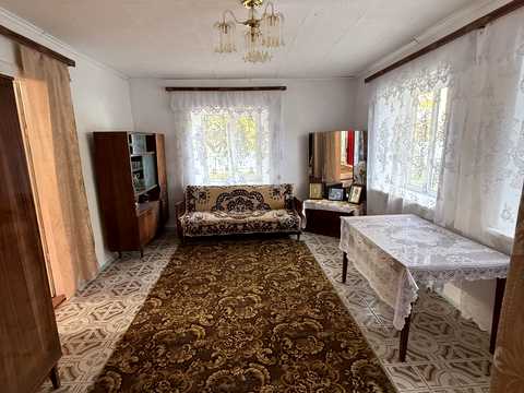 будинок за адресою с. Романівка, Шевченка, 85
