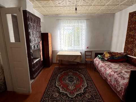 будинок за адресою с. Романівка, Шевченка, 85
