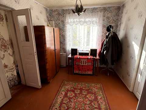 будинок за адресою с. Романівка, Шевченка, 85