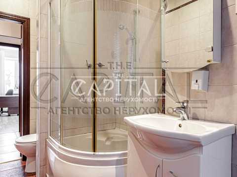 комерційна за адресою Шовковична вул., 7-А