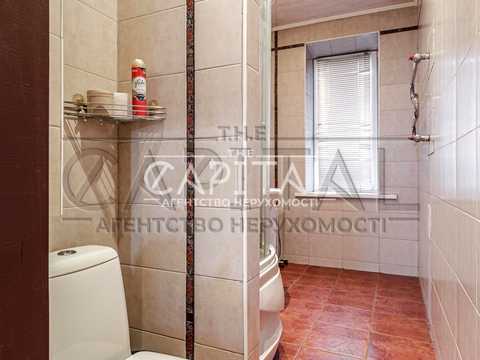 комерційна за адресою Шовковична вул., 7-А