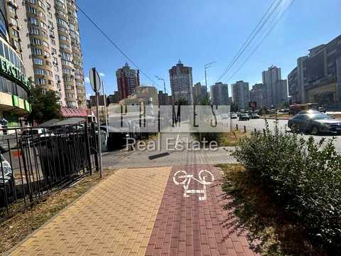 комерційна за адресою Дніпровська набережна вул., 23