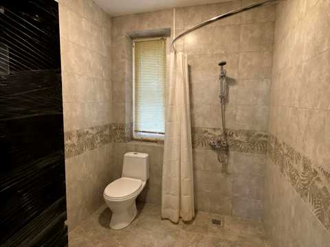 будинок за адресою смт. Ворзель, Варшавська вул. (Ватутіна), 103