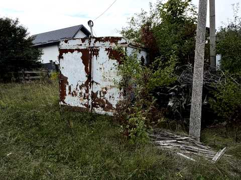 ділянка за адресою с. Карпилівка, Садова