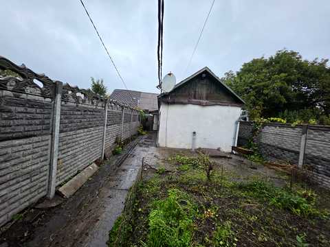 будинок за адресою Кам'янське (Дніпродзержинськ), Історична вул. (Короленківська), 62