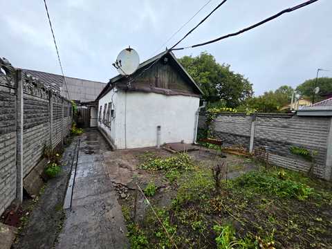будинок за адресою Кам'янське (Дніпродзержинськ), Історична вул. (Короленківська), 62