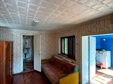 будинок за адресою с. Микуличі, Хутірська вул. (Будьонного), 1