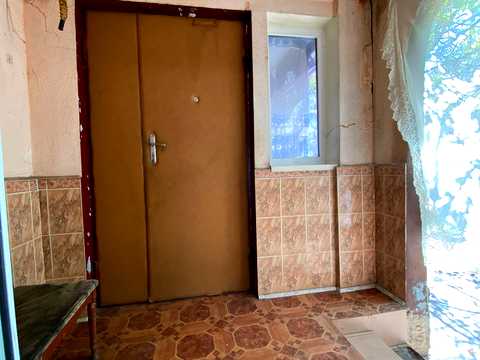 будинок за адресою с. Шкарівка, Центральна