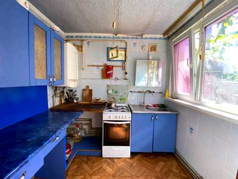будинок за адресою с. Шкарівка, Центральна