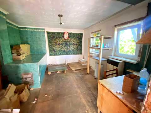 будинок за адресою с. Шкарівка, Центральна
