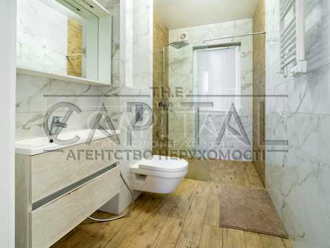 будинок за адресою с. Гатне, Валерія Марченка вул., 10-В