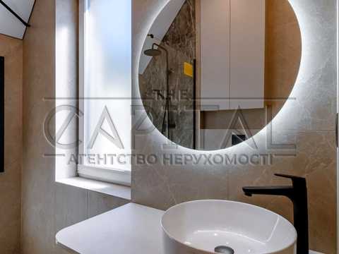 будинок за адресою с. Крюківщина, Георгія Мальцева вул., 10