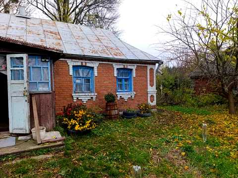 будинок за адресою Анатолія Комасюка, 33