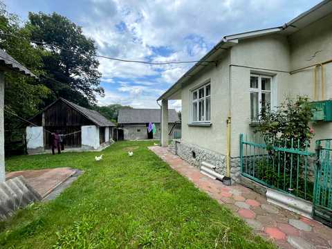 участок по адресу Тростянець, 1