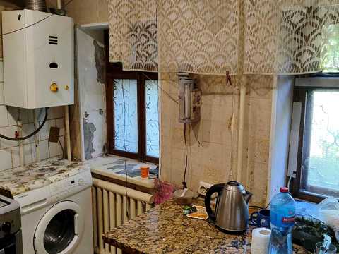 дом по адресу Слободской спуск (Романівська)