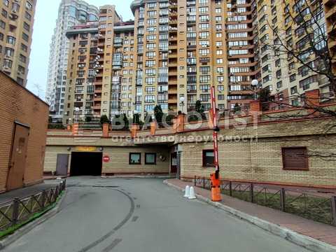 комерційна за адресою Євгена Коновальця вул. (Щорса), 32-Б