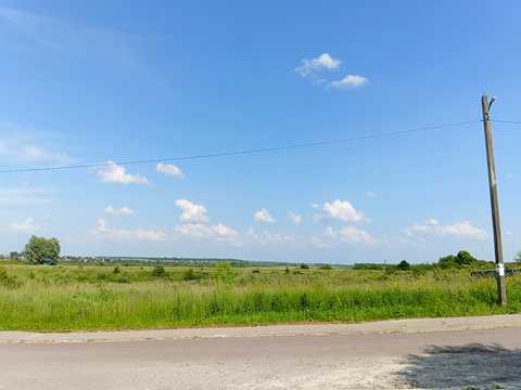 ділянка за адресою с. Кам'янопіль, Грушевського, 1