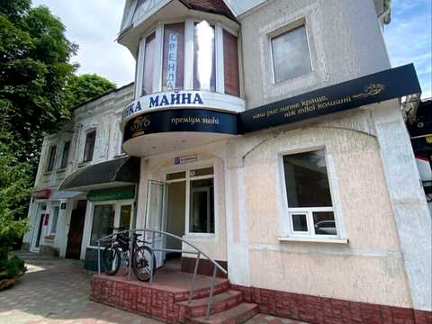 комерційна за адресою Грушевського вул., 57