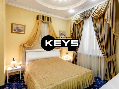 комерційна за адресою Трьохсвятительська вул., 9