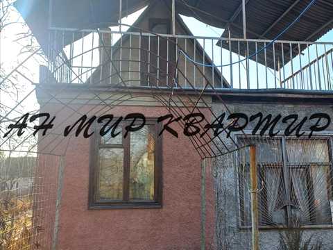 будинок за адресою Колійна вул. (Вороніна), 100