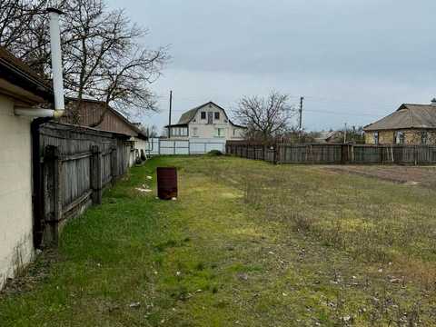 ділянка за адресою центральна