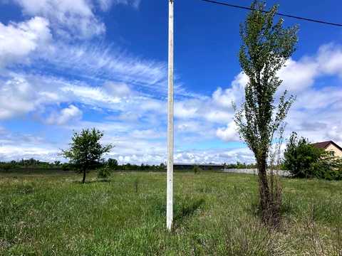 участок по адресу Тополинна, 55