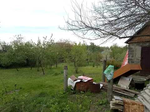 участок по адресу Мельниківська