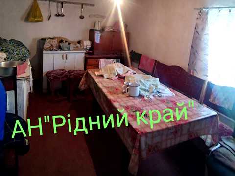 будинок за адресою с. Крюкове, Центральна, 10