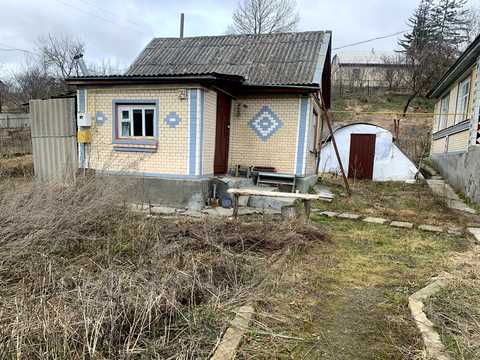 будинок за адресою смт. Меджибіж, Набережна