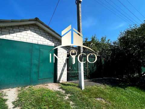 дом по адресу Комарова, 27