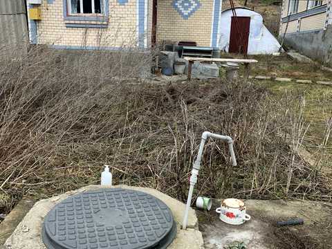 будинок за адресою смт. Меджибіж, Набережна